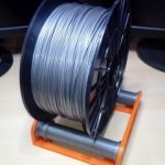 Filament tartó